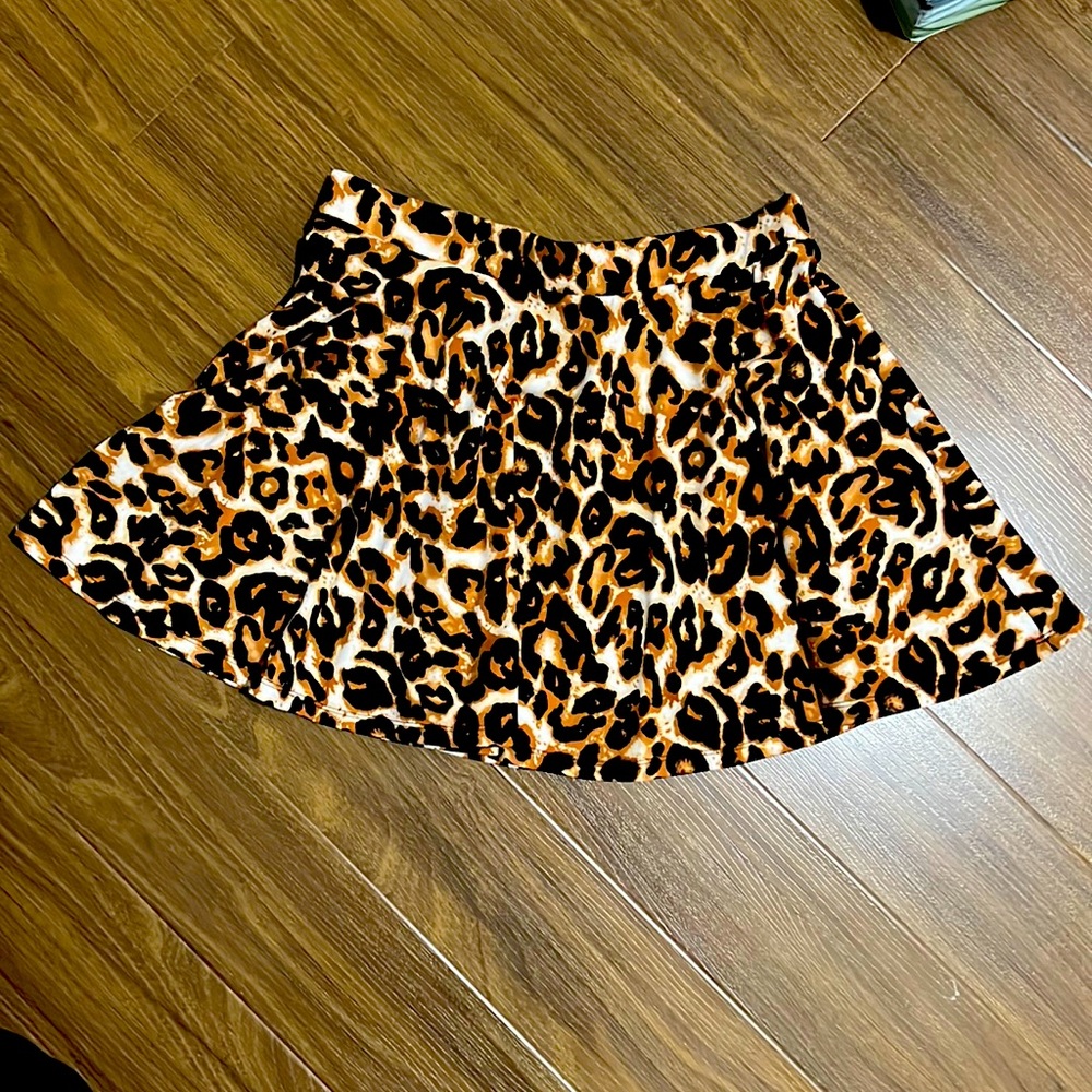 Full circle fun leopard mini skirt